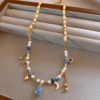 Celestial Pearl Necklace – Moon Star Teardrop Pendant5